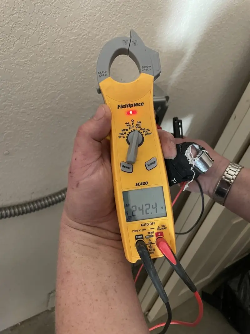 Voltage testing with clamp meter during Generator Installation in Oswego